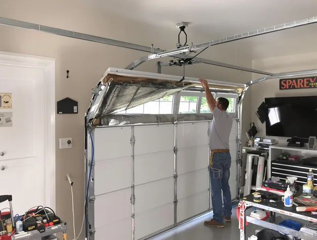 Garage door section replacement by East Lyme Garage Door Repair in East Lyme