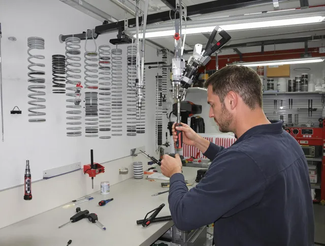 East Lyme Garage Door Repair safety certified technician performing precision spring replacement in East Lyme