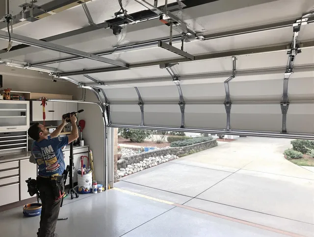Garage door track repair service by East Lyme Garage Door Repair in East Lyme